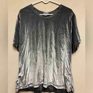 This is a silver faux velvet blouse. That is in a size 2X.